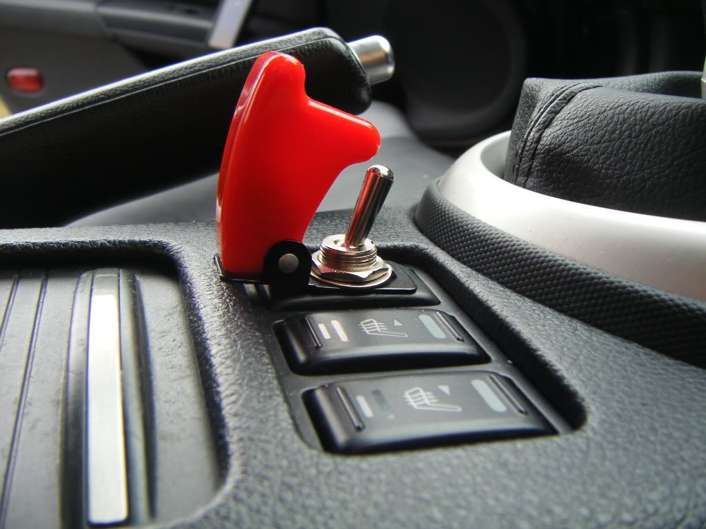 Blank switch next to heated seats. 350Z General 350Z & 370Z UK